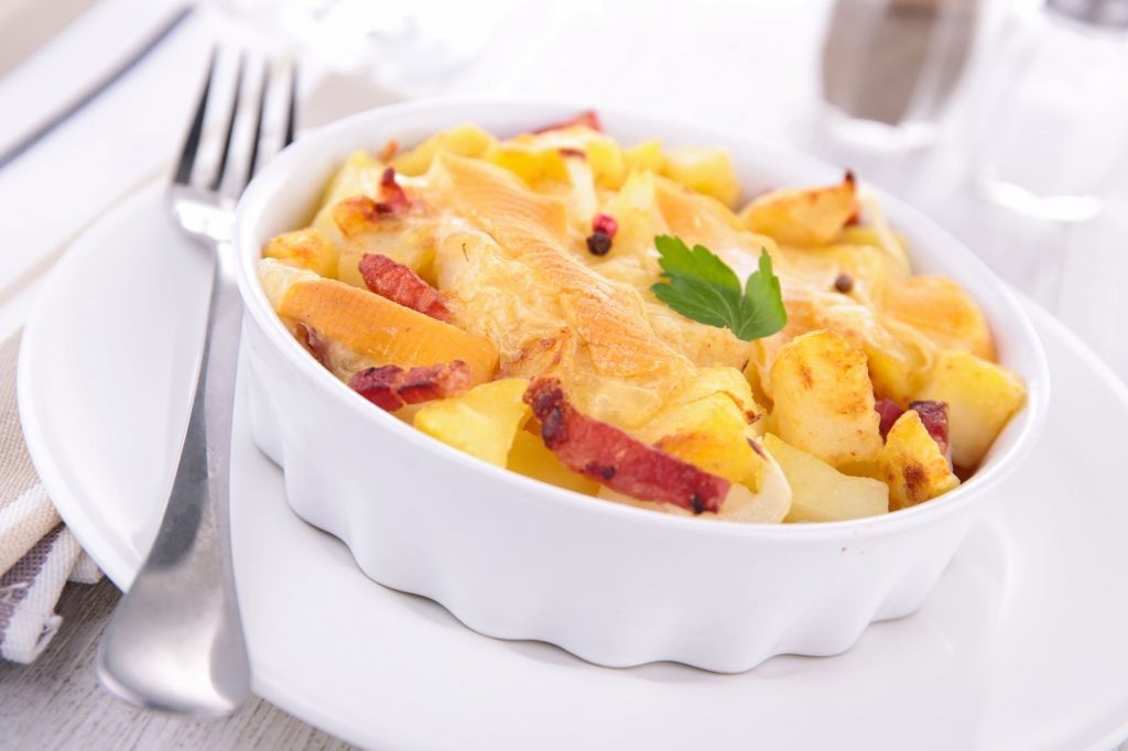 Potato with bacon and cheese in the oven: a step by step recipe with photo