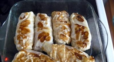 Stuffed cabbage rolls with a cheese coat How to cook cabbage rolls with a cheese coat