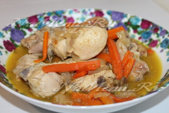 Chicken stewed with onions and carrots